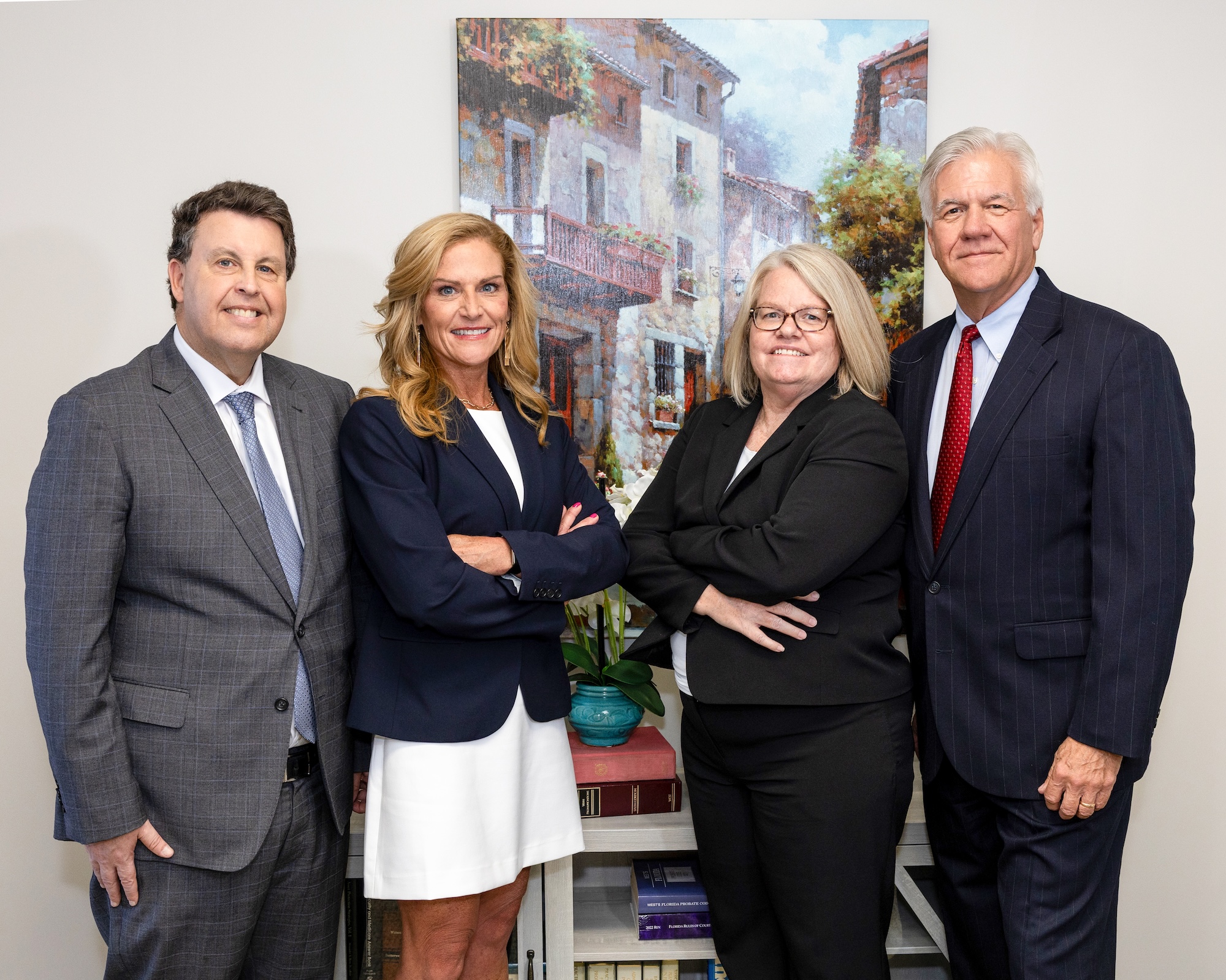 Group photo of four lawyers in our law group, all associates at Guffey & Kostun Law Group